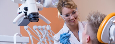 Dentist about to give a patient a dental exam