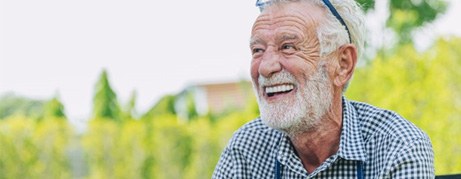 Man laughs over food