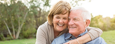 Patient in Commack smiling with dentures