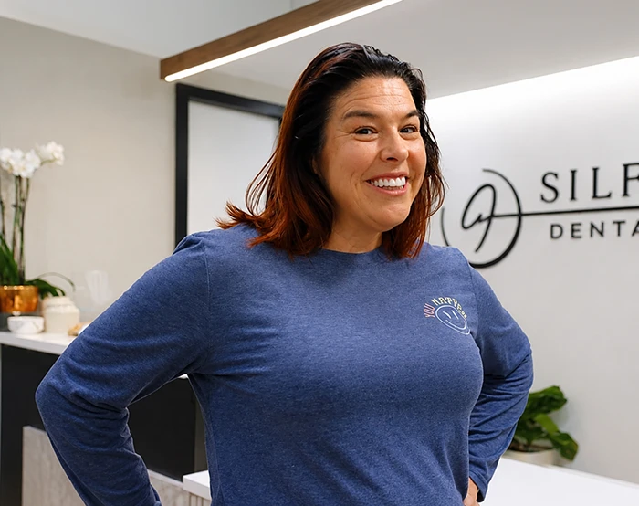 Salina showing off her new smile in the Silfa Dental office