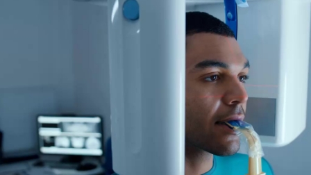 Man getting dental scans taken