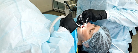Woman getting dental treatment