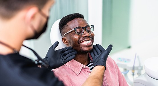 Man smiling in the dental chair