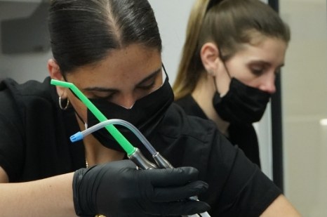 Silfa Dental hygienists working with a patient