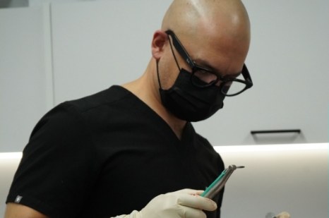 Dr. Silfa working on a patient